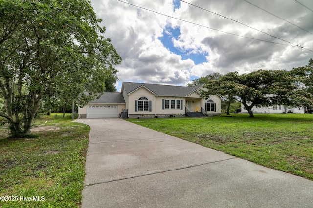 60 Pine Lake Rd, Southport, NC 28461 - ranch-style house with concrete driveway, crawl space, an attached garage, and a front lawn
