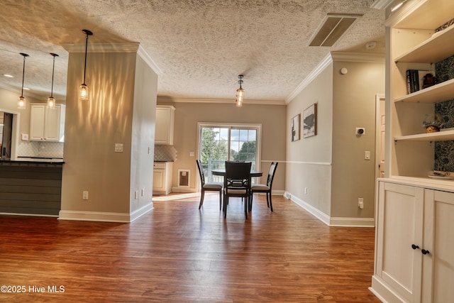 60 Pine Lake Rd, Southport, NC 28461 - dining area featuring dark wood finished floors, crown molding, and baseboards