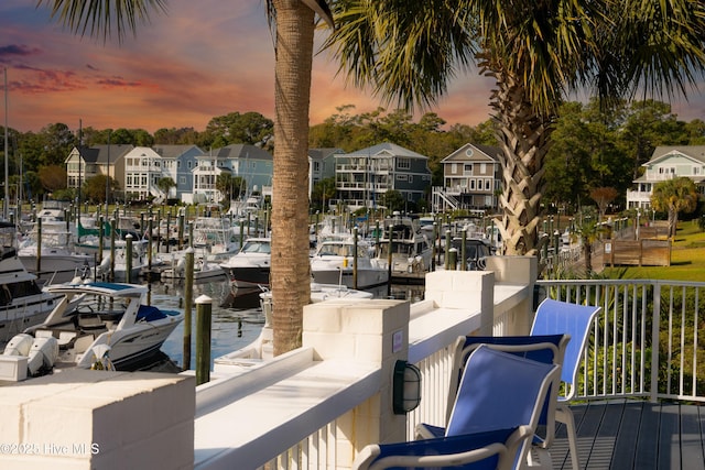 3792 Bancroft Pl, Southport, NC 28461 - wooden terrace featuring a dock and a residential view