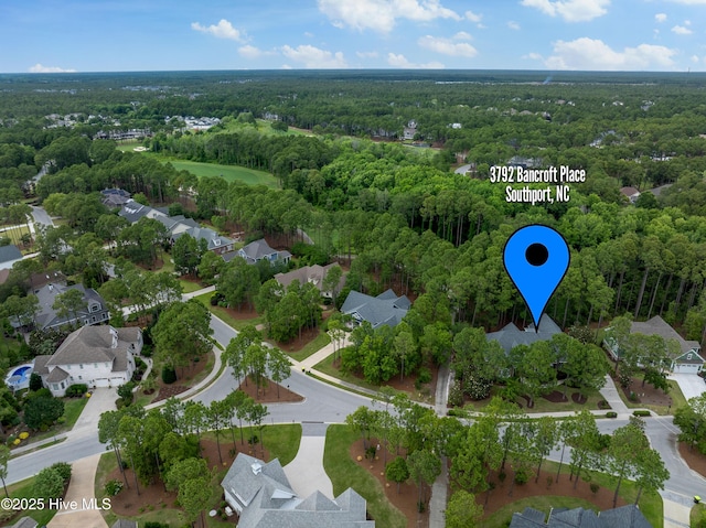 3792 Bancroft Pl, Southport, NC 28461 - aerial view of residential area with a heavily wooded area