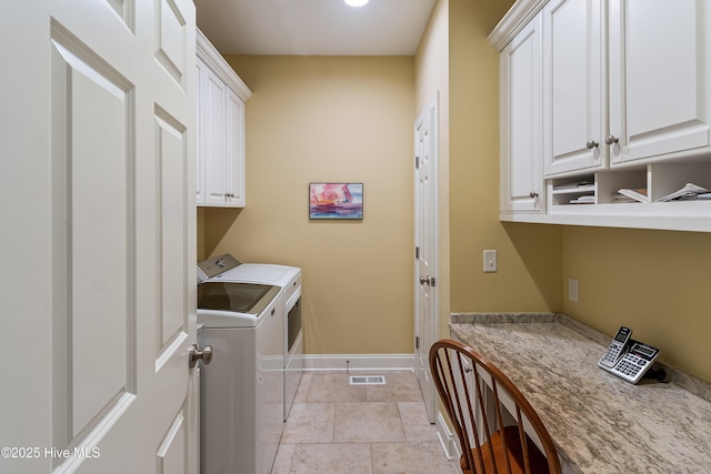 3792 Bancroft Pl, Southport, NC 28461 - washroom with independent washer and dryer, cabinet space, and baseboards