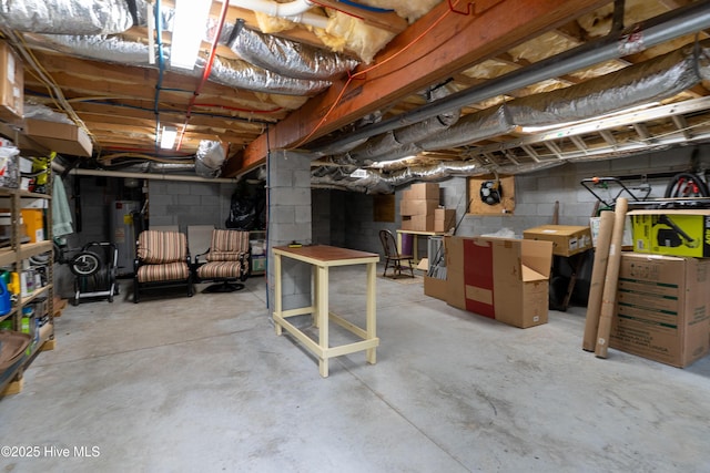 3792 Bancroft Pl, Southport, NC 28461 - unfinished basement with water heater and concrete block wall