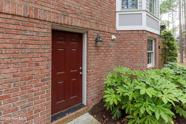 3792 Bancroft Pl, Southport, NC 28461 - doorway to property featuring brick siding