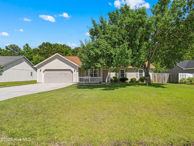 245 Parnell Rd, Hubert, NC 28539 - ranch-style house with concrete driveway, an attached garage, a porch, and stucco siding