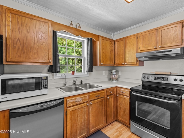 245 Parnell Rd, Hubert, NC 28539 - kitchen featuring electric stove, stainless steel dishwasher, under cabinet range hood, white microwave, and a sink