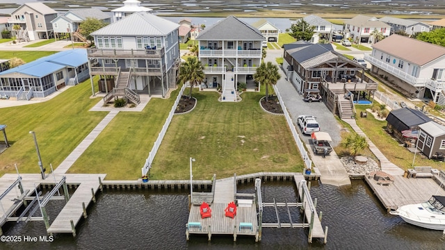 9089 W 9th St, Surf City, NC 28445 - aerial perspective of suburban area with a large body of water