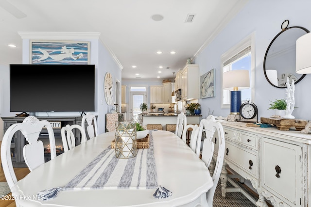 9089 W 9th St, Surf City, NC 28445 - dining space with crown molding and recessed lighting