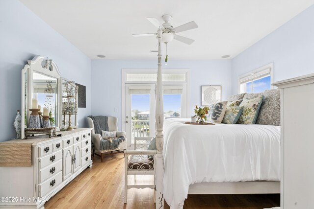 9089 W 9th St, Surf City, NC 28445 - bedroom with access to outside, light wood-type flooring, and ceiling fan