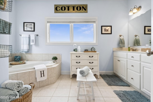 9089 W 9th St, Surf City, NC 28445 - full bath featuring vanity, a bath, tile patterned flooring, and baseboards
