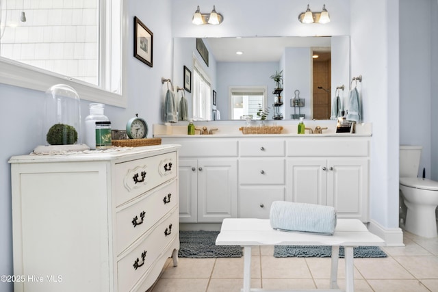 9089 W 9th St, Surf City, NC 28445 - full bath with tile patterned floors, double vanity, and toilet