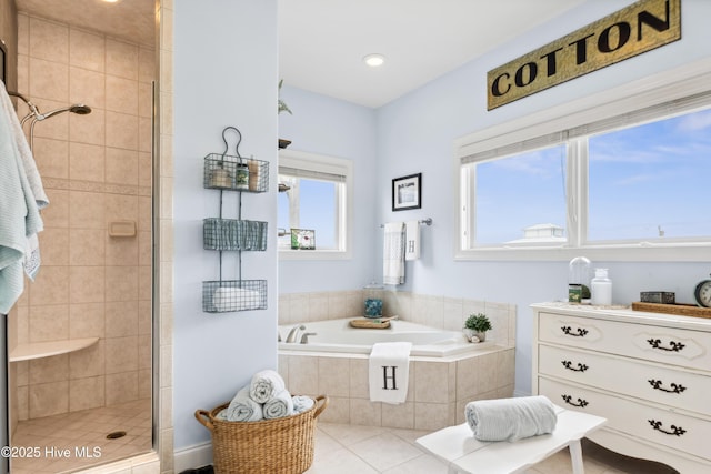9089 W 9th St, Surf City, NC 28445 - bathroom featuring a bath, a shower stall, and tile patterned floors
