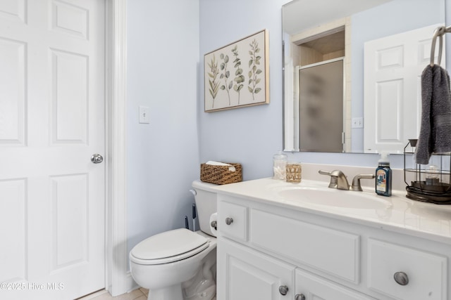 9089 W 9th St, Surf City, NC 28445 - full bathroom with vanity, a stall shower, and toilet