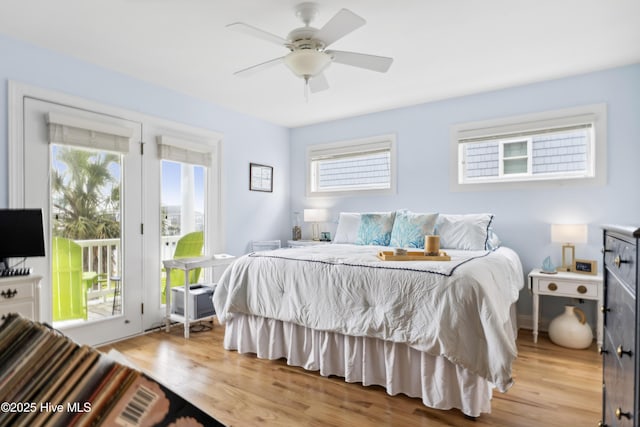 9089 W 9th St, Surf City, NC 28445 - bedroom with access to exterior, light wood-style floors, and a ceiling fan