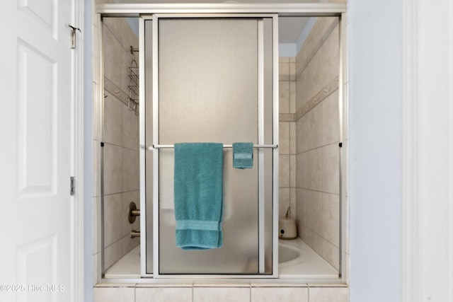 9089 W 9th St, Surf City, NC 28445 - full bathroom featuring tiled shower / bath