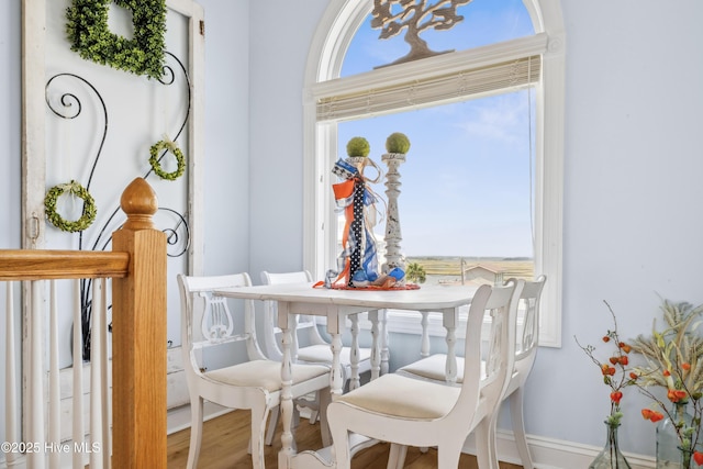 9089 W 9th St, Surf City, NC 28445 - dining space with wood finished floors and baseboards