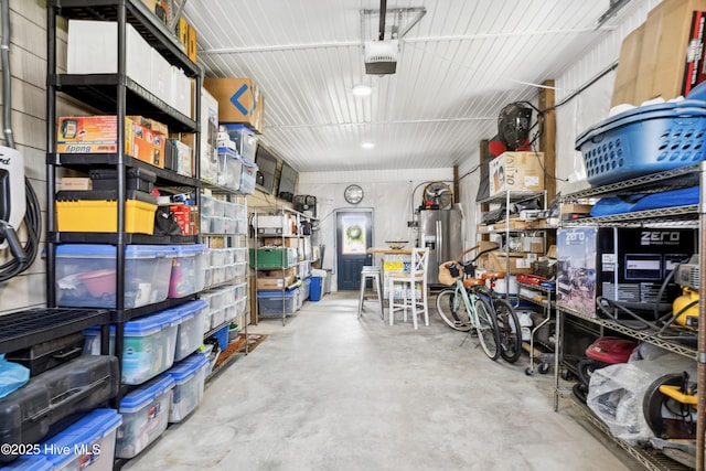 9089 W 9th St, Surf City, NC 28445 - storage room featuring a garage and water heater
