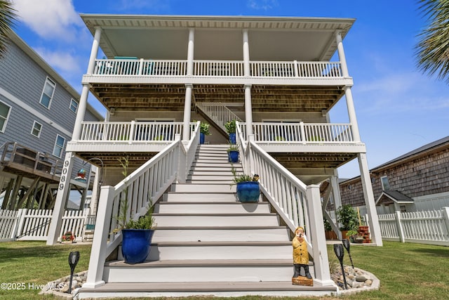 9089 W 9th St, Surf City, NC 28445 - view of front of property featuring stairs