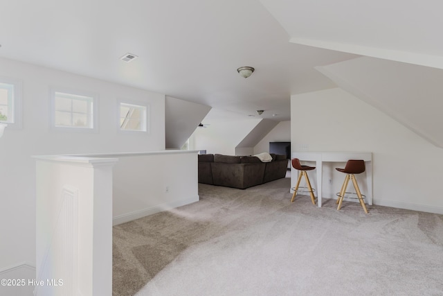 358 Folkstone Rd, Holly Ridge, NC 28445 - bonus room featuring lofted ceiling, carpet, plenty of natural light, and baseboards