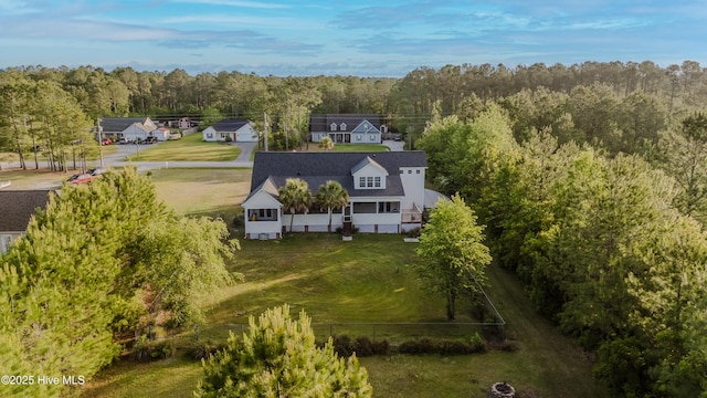 358 Folkstone Rd, Holly Ridge, NC 28445 - view from above of property with a forest
