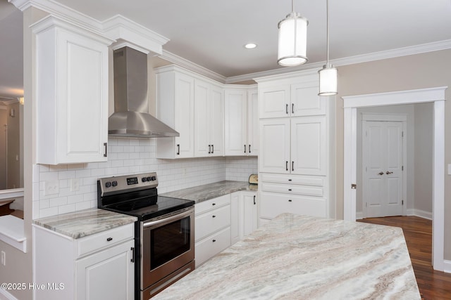 244 Red Fox Run Dr, Wallace, NC 28466 - kitchen with stainless steel range with electric stovetop, wall chimney range hood, decorative backsplash, dark wood finished floors, and white cabinets