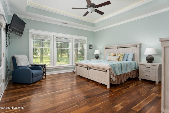 244 Red Fox Run Dr, Wallace, NC 28466 - bedroom featuring a tray ceiling, dark wood-style floors, crown molding, and ceiling fan