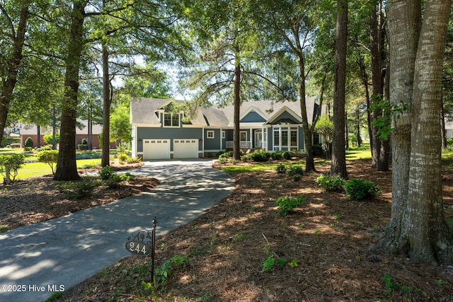 244 Red Fox Run Dr, Wallace, NC 28466 - view of front of property with driveway, a garage, and a shingled roof