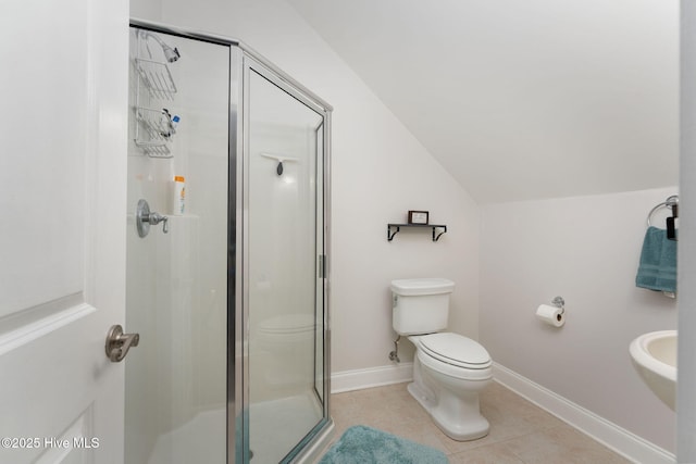 244 Red Fox Run Dr, Wallace, NC 28466 - bathroom with a shower stall, vaulted ceiling, and tile patterned flooring