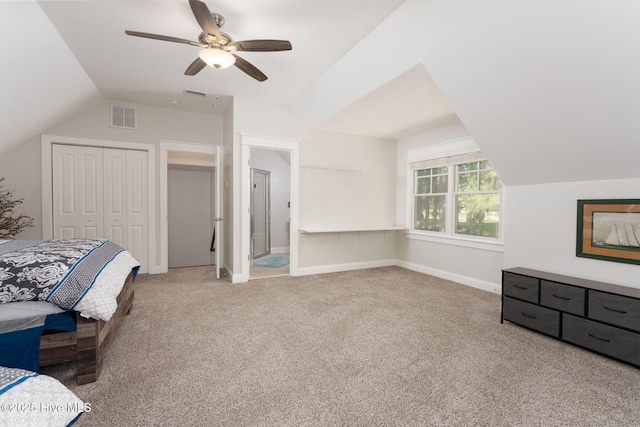 244 Red Fox Run Dr, Wallace, NC 28466 - carpeted bedroom with vaulted ceiling, a closet, and a ceiling fan