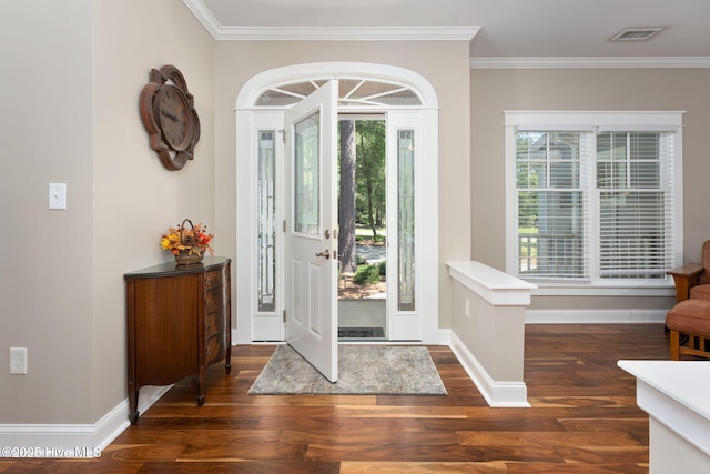 244 Red Fox Run Dr, Wallace, NC 28466 - entryway featuring wood finished floors, healthy amount of natural light, and crown molding