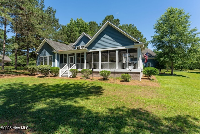 244 Red Fox Run Dr, Wallace, NC 28466 - back of property featuring a sunroom and a lawn