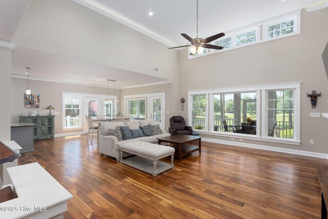 244 Red Fox Run Dr, Wallace, NC 28466 - living room featuring ornamental molding, dark wood finished floors, ceiling fan, recessed lighting, and a high ceiling