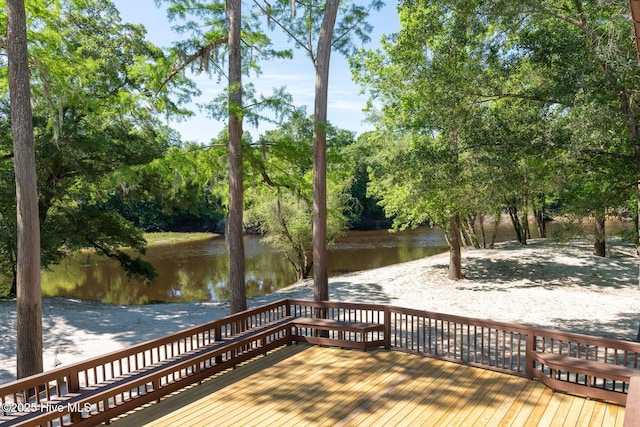244 Red Fox Run Dr, Wallace, NC 28466 - wooden terrace featuring a water view and view of wooded area