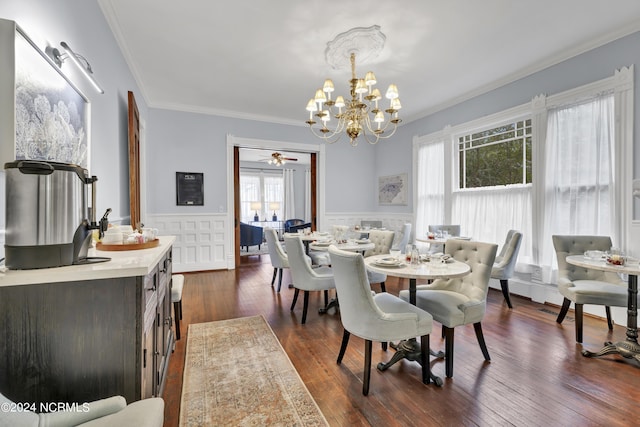 412 S 3rd St, Wilmington, NC 28401 - dining space with a wainscoted wall, crown molding, a chandelier, and dark wood-style floors