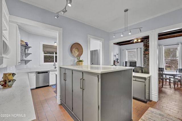 412 S 3rd St, Wilmington, NC 28401 - kitchen featuring stainless steel dishwasher, open shelves, healthy amount of natural light, gray cabinets, and crown molding