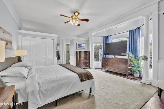 412 S 3rd St, Wilmington, NC 28401 - bedroom with wood finished floors, a closet, ceiling fan, and decorative columns
