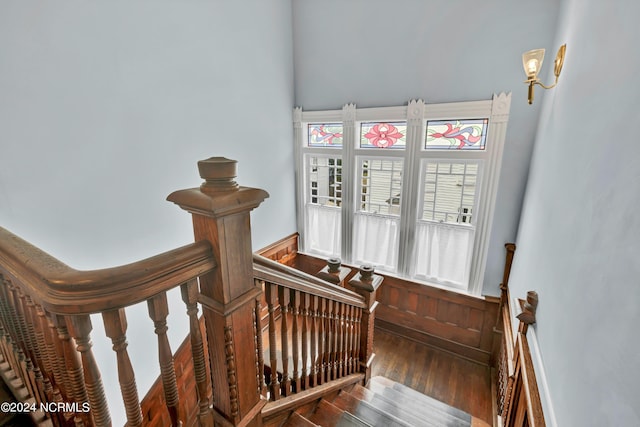 412 S 3rd St, Wilmington, NC 28401 - stairway featuring wood finished floors and a wainscoted wall