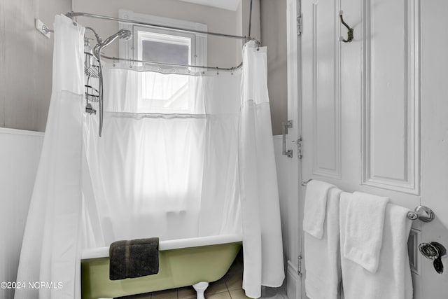 412 S 3rd St, Wilmington, NC 28401 - bathroom with shower / tub combo and tile patterned floors