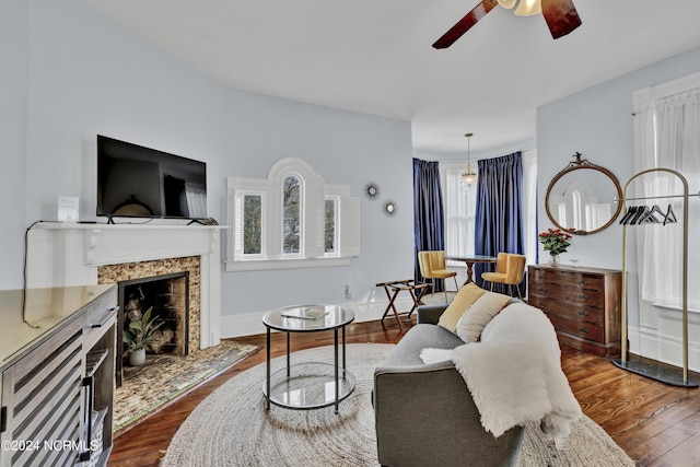 412 S 3rd St, Wilmington, NC 28401 - living room featuring a ceiling fan, plenty of natural light, dark wood-style flooring, and a fireplace