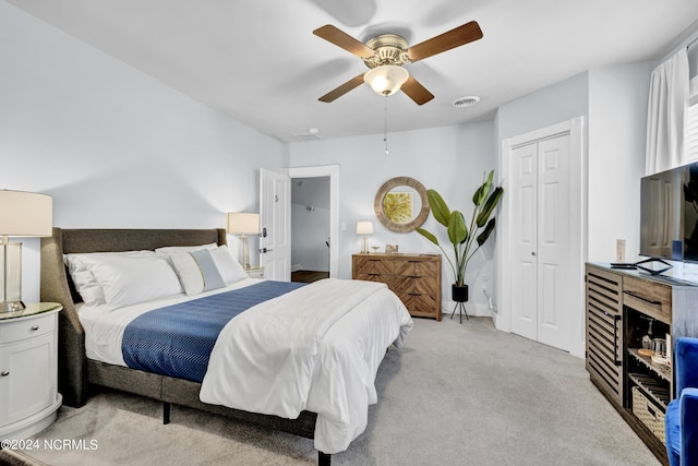 412 S 3rd St, Wilmington, NC 28401 - bedroom with light carpet, a closet, and ceiling fan