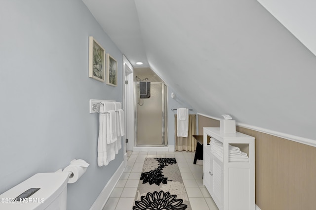 412 S 3rd St, Wilmington, NC 28401 - full bathroom featuring lofted ceiling, a stall shower, toilet, tile patterned flooring, and baseboards