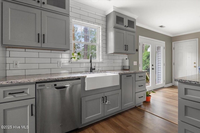 8 Saunders Ln, Pinehurst, NC 28374 - kitchen with stainless steel dishwasher, a sink, gray cabinets, crown molding, and backsplash