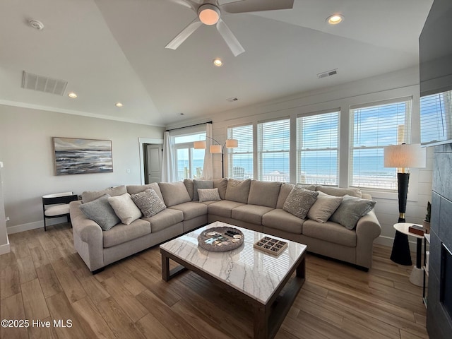 1012 New River Inlet Rd, North Topsail Beach, NC 28460 - living room featuring lofted ceiling, baseboards, ceiling fan, wood finished floors, and recessed lighting