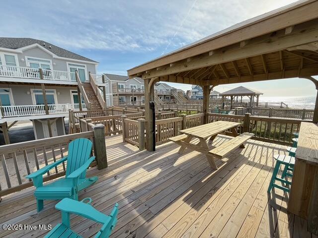 1012 New River Inlet Rd, North Topsail Beach, NC 28460 - wooden deck featuring a gazebo and stairs