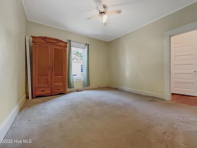 110 Virginia Rd, Edenton, NC 27932 - unfurnished bedroom featuring light colored carpet, crown molding, baseboards, and a ceiling fan