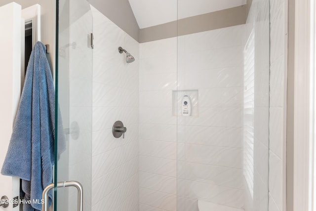 299 Waterway Dr, Sneads Ferry, NC 28460 - bathroom with a shower stall and lofted ceiling