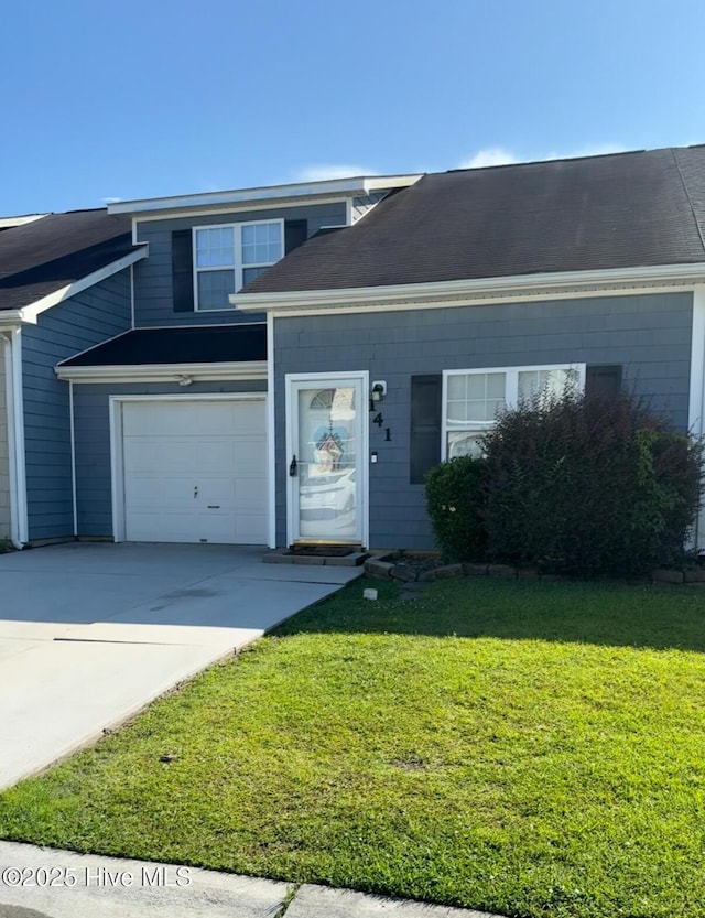 141 Jessie Cir, Hubert, NC 28539 - view of front of property with a front lawn, driveway, and an attached garage