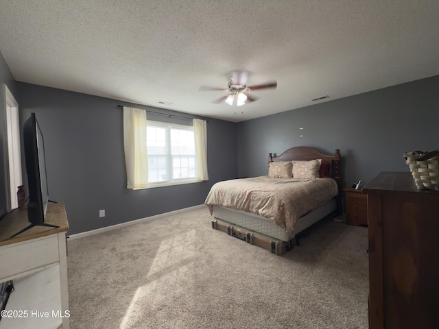 141 Jessie Cir, Hubert, NC 28539 - bedroom featuring carpet flooring, a textured ceiling, and ceiling fan