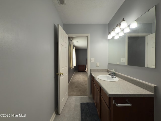 141 Jessie Cir, Hubert, NC 28539 - bathroom featuring vanity and a textured ceiling