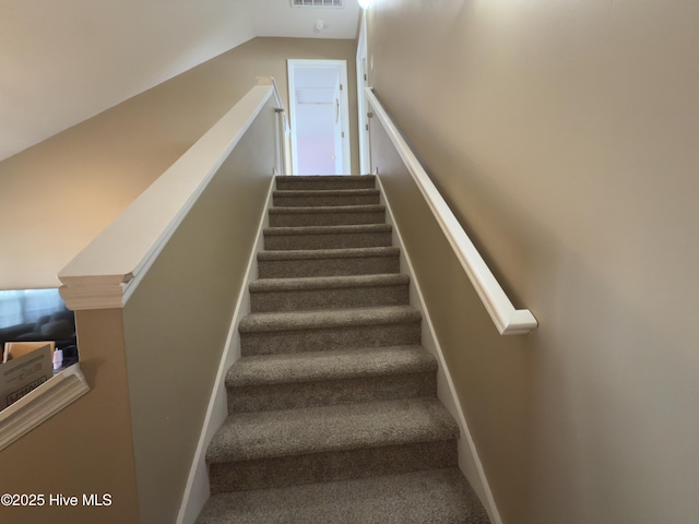 141 Jessie Cir, Hubert, NC 28539 - stairway featuring carpet flooring, healthy amount of natural light, and lofted ceiling