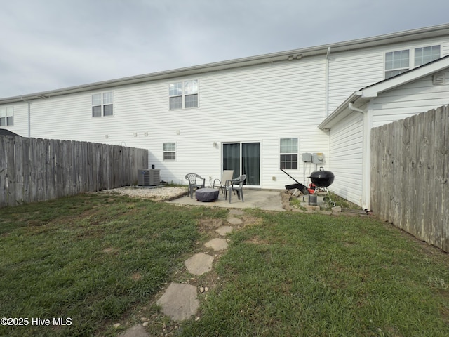 141 Jessie Cir, Hubert, NC 28539 - back of house with a fenced backyard and a patio